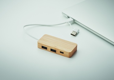 Logo trade firmakingituse pilt: Bambusest USB 3 pordiga jaotur