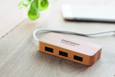 Logotrade meene foto: Bambusest USB 3 pordiga jaotur