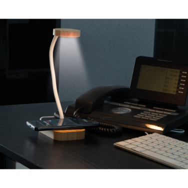 Logo trade reklaamkingituse pilt: Juhtmeta laadijaga laualampTomsk