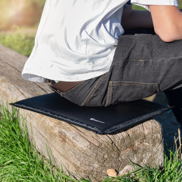 Logotrade presentreklam bild: Uppblåsbar kudde ANTERO Schwarzwolf